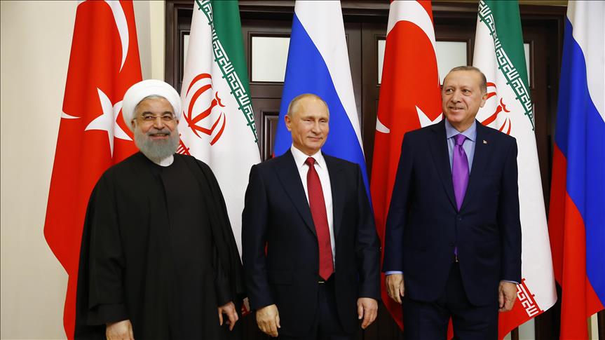 Iranian President Rouhani (L), Russian President Putin (C) and Turkish President Erdogan