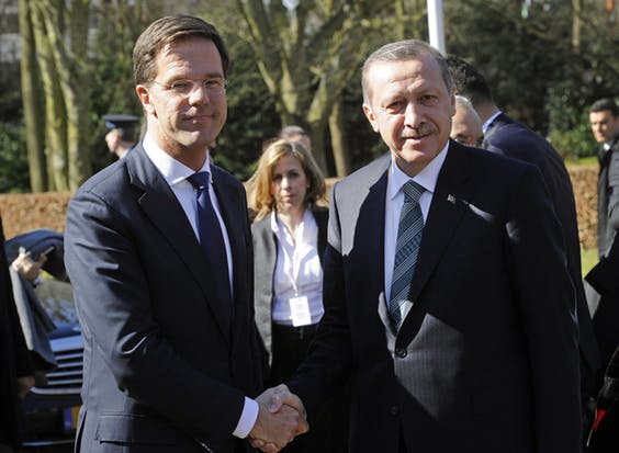 Dutch Prime Minister Mark Rutte and Turkish President Recep Tayyip Erdogan shakes hands