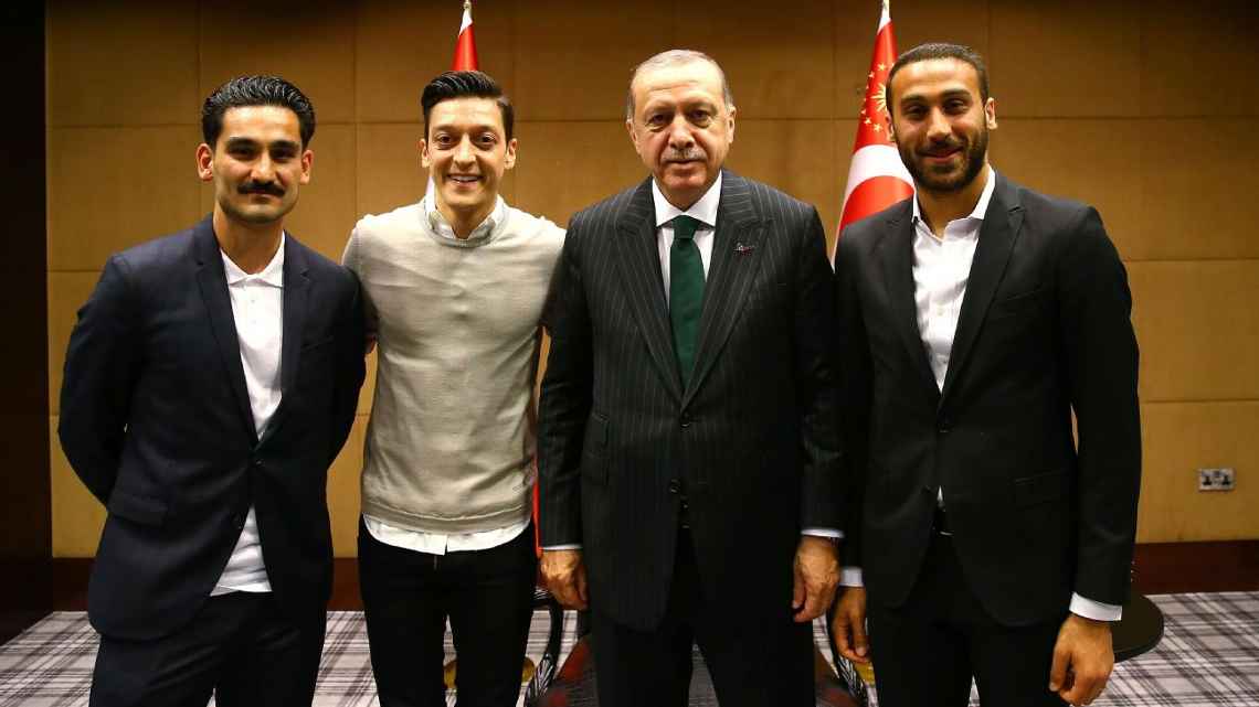Germany reacts to Mesut Ozil and Ilkay Gundogan for a picture taken with President Erdogan.