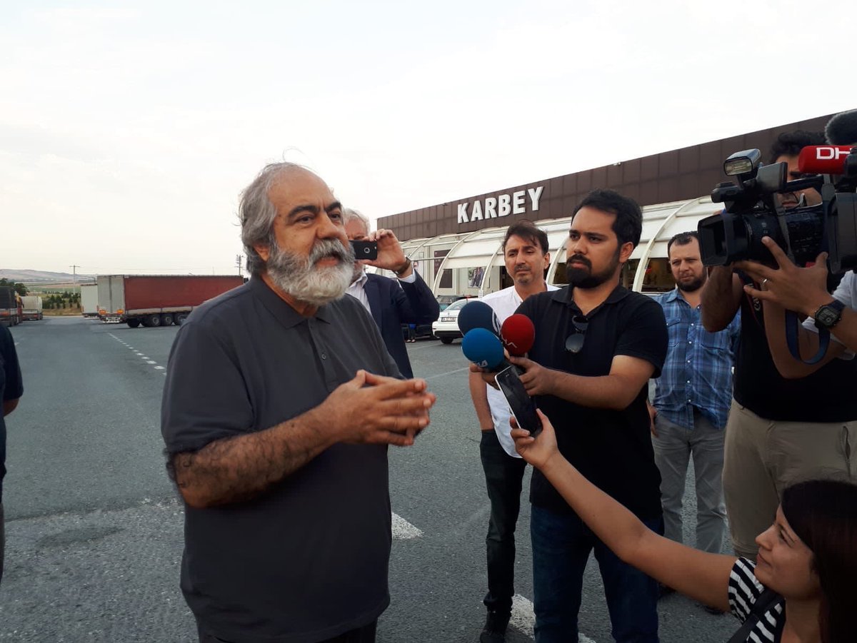 Mehmet Altan speaks to media after his release in Istanbul