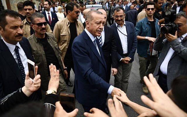 Erdogan leaves polling station in Istanbul