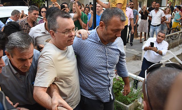 Pastor Brunson left prison on Wednesday in Izmir