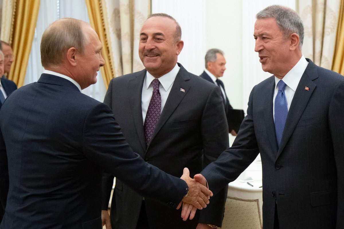 Putin, Akar and Cavusoglu in Moscow