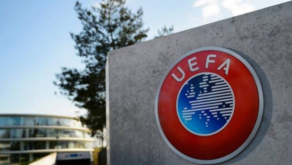 UEFA logo on a wall.