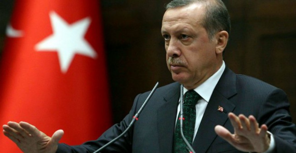 Turkish President Recep Tayyip Erdogan speaking to an audience.