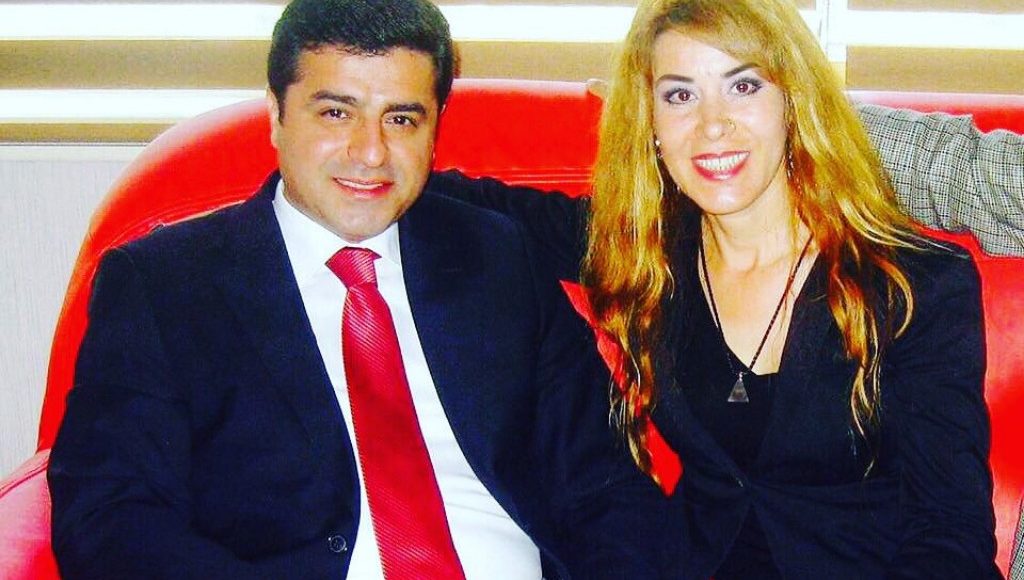 Singer Saide Inac (R) sitting next to HDP chairman Selahattin Demirtas.